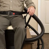Man using a curved stair lift