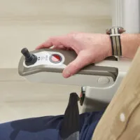 Hand on stairlift control panel