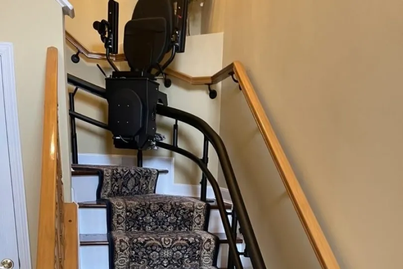 Curved stair lift on staircase