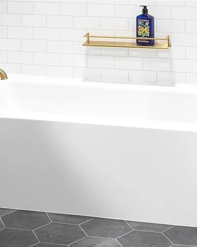 Beautiful bathtub with gold fixures