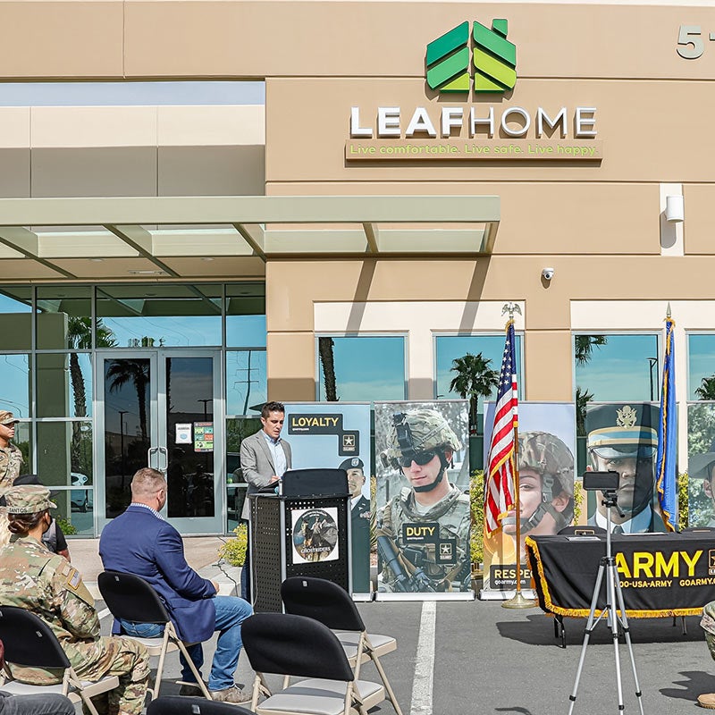 several leaf home employees speaking during a veteran event